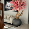 Globe en métal gris anthracite mat avec cerisier en fleurs bicolore réalisé sur mesure