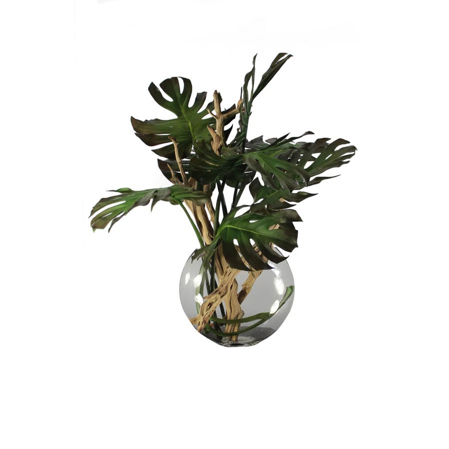 Vase Lune avec feuille de Monstera et bois flotté